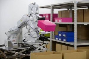 Hitachi’s double-arm robot during a demonstration at a warehouse in Chiba prefecture, Japan.—Bloomberg News